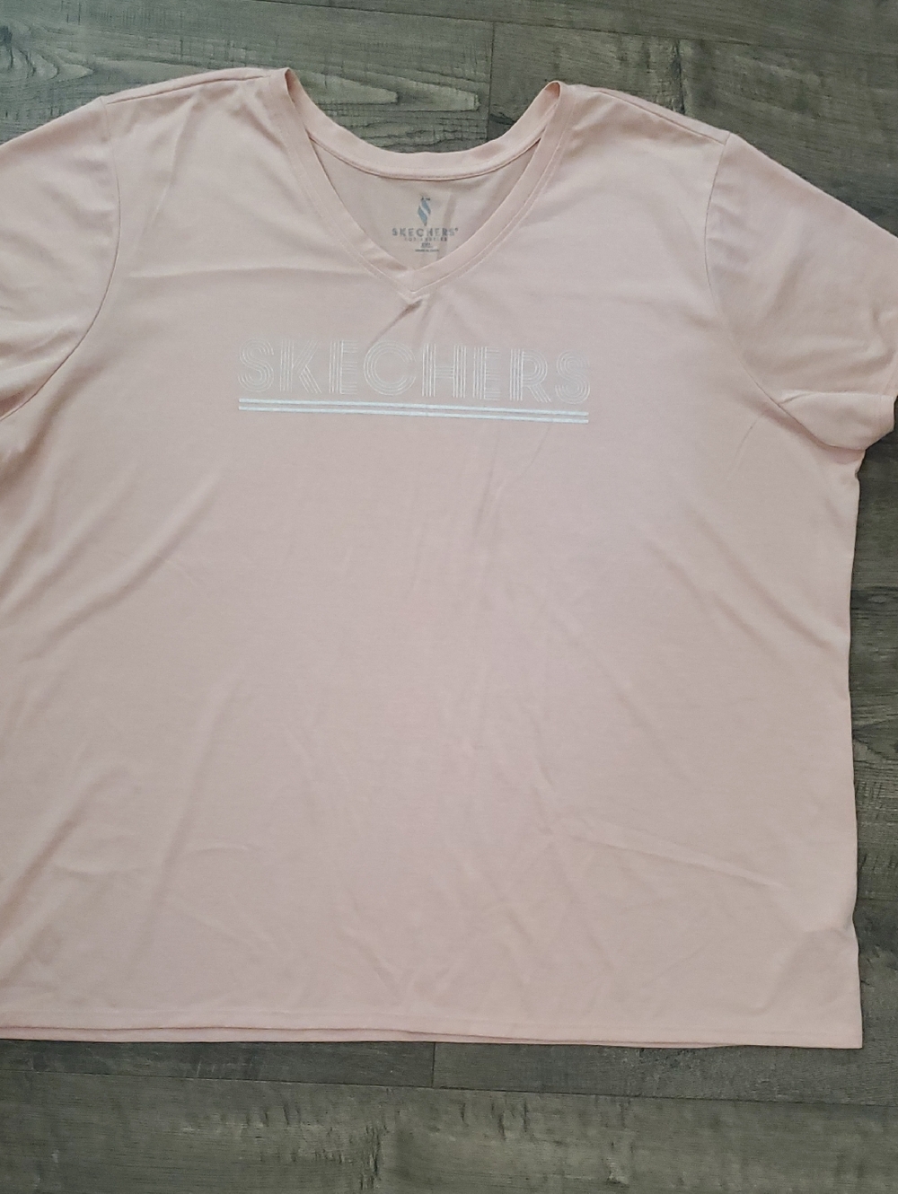 Skechers Women's Short Sleeve V-Neck Tee in Light Pink
